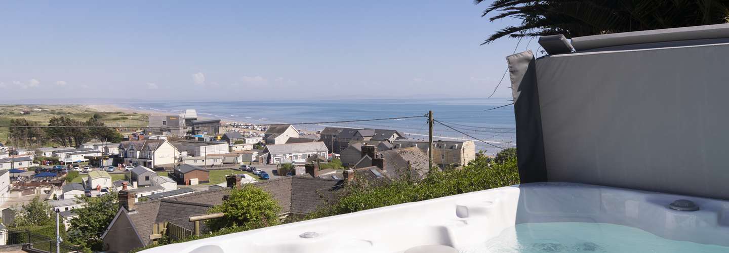 Rose Cottage - Sea Views, Hot Tub, Log Burner