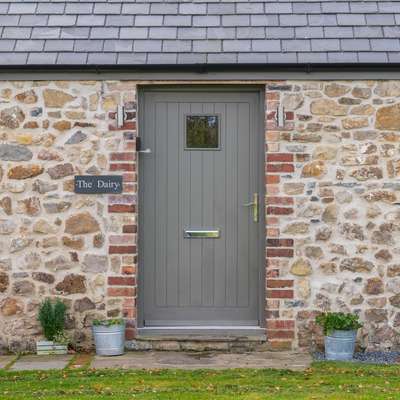 The Dairy - Luxury Cottage with Hot Tub and Views - Barn door